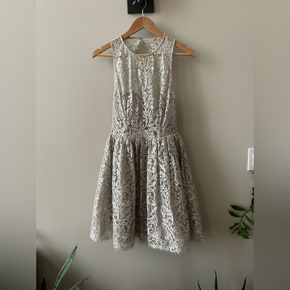 Le Chateau Champagne and Silver dress. Size 2